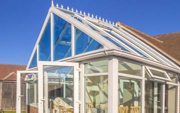 conservatory roof insulation costs Burton Bradstock