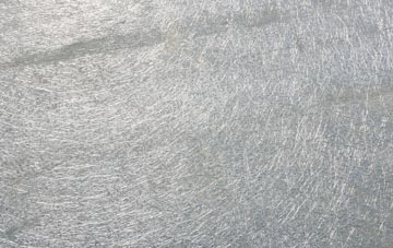 Burton Bradstock laminate fibreglass or shingles?